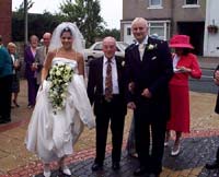 Sarah and John with her Grandfather....Who also played the Organ at the Wedding Service!