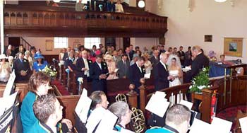 Sarah, John & Guests join in song in celebration of their Marriage at Ferryhill Village Methodist Church